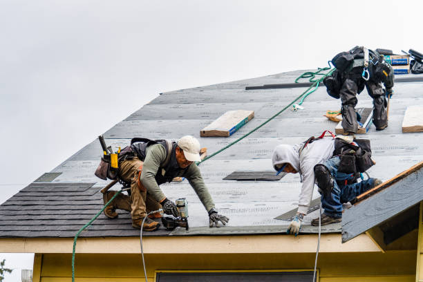 Professional Gutter Installation technician working in Etna, CA